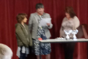 Photo of Lorelei Tomkinson being awarded the Junior Citizen of the Year at the 2022 St. Just Town Citizens Awards